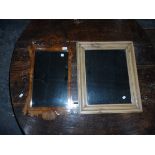 A walnut framed mirror with scroll top together with a pine mirror
