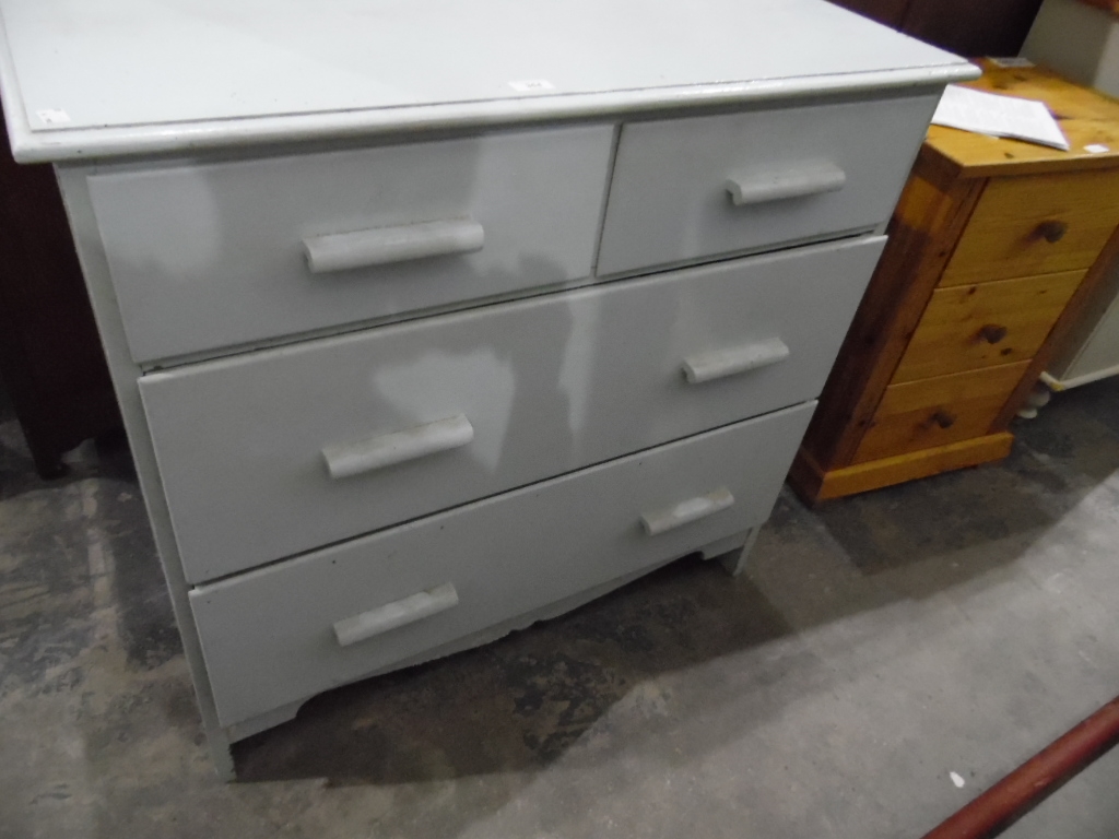 A painted chest of drawers