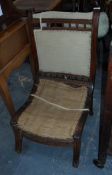 An oak dressing room chair (stuffing coming out of top,
