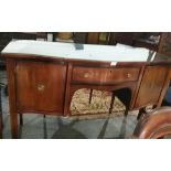 A serpentine fronted sideboard with strung border to top,