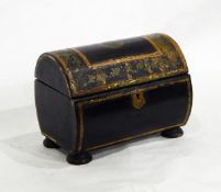 A 19th century papier mache tea caddy having domed top, with gilt and green painting,