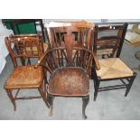 A 19th century elm and fruitwood Windsor elbow chair,