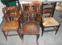 A 19th century elm and fruitwood Windsor elbow chair,
