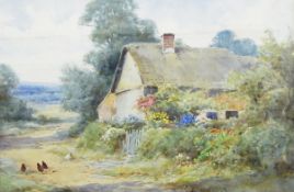 Henry John Sylvester-Stannard (1870-1951) Watercolour drawing Thatched rural cottage with garden,