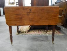 A mid 19th century mahogany Pembroke table fitted one drawer and one dummy drawer to frieze,