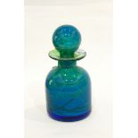 A Mdina glass bottle with stopper, the blue glass with veins of green and yellow,