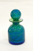 A Mdina glass bottle with stopper, the blue glass with veins of green and yellow,