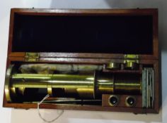 A brass monocular microscope by J H Steward, 406 Strand, London,