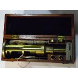 A brass monocular microscope by J H Steward, 406 Strand, London,