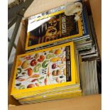 Five boxes of assorted books and magazines including National Geographic volumes and fiction and