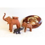 A terracotta model/vessel of an elephant, with incised decoration and well to the back,