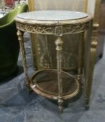 An oval gilt two-tier side table with faux-marble top,