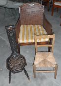 A carved spinning chair, a caned armchair by Shoolbred,