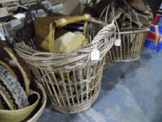 A large quantity of various baskets including shopping and laundry