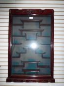 Oriental hardwood glazed wall-hanging display cabinet