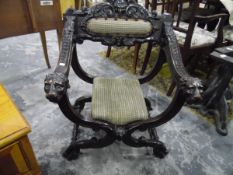 Early 19th century X-framed chair, with floral carved cross rail,
