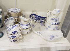 A Copeland Spode china 'Blue Bowpot' pattern teaset comprising teacups and saucers, side plates,