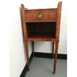 A pair of 20th century walnut veneered side tables with faux marble tops,