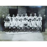 Photograph of cricket team with cup, signed in margin, framed,