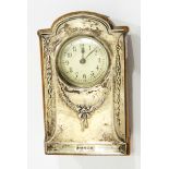 A silver mounted mantel clock,
