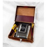 A Polaroid land camera model J66,