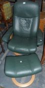 A faux-green leather office chair with footstool