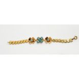 A gold-coloured bracelet,