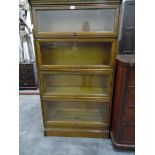 A four tier Globe Wernicke-style bookcase with glazed front,