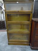 A four tier Globe Wernicke-style bookcase with glazed front,