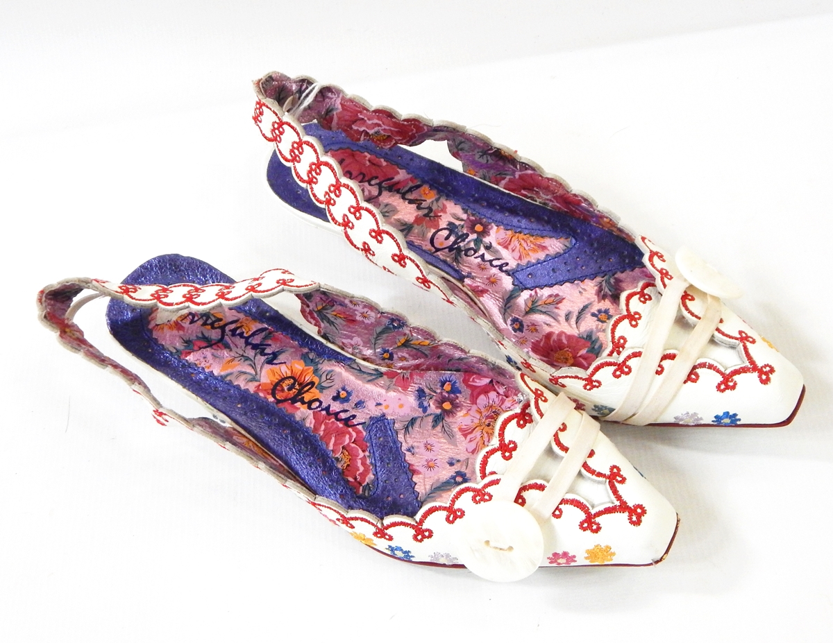 A pair of vintage flat sling-back shoes marked "Irregular Choice",