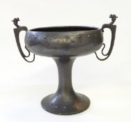 An Art Nouveau two-handled pewter cup, 23cm high approx.