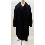 A black astrakhan coat labelled "Emerson & Co, 74 George Street,