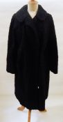 A black astrakhan coat labelled "Emerson & Co, 74 George Street,