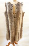 A faux-fur and faux suede full-length gilet