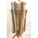 A faux-fur and faux suede full-length gilet