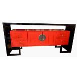 A Chinese lacquer sideboard with red mid section,