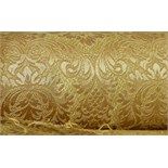 A length of Italian gold damask fabric on a roll, approximately 30 years old,