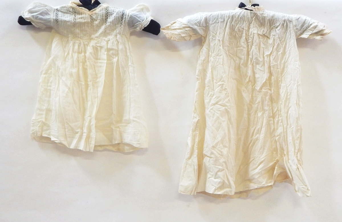 Various christening gowns,