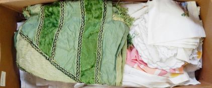 Various linen and other tableware within a vintage laundry box