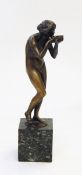 A Victor Heinrich Seifert (German 1870-1953) "Trinkende" bronze figure of a woman drinking from a