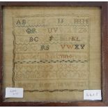 A late 18th/early 19th century sampler with the alphabet and with embroidered depictions of crowns