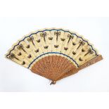 A Chinese wooden brise fan, both guard sticks slightly damaged, embroidered with black butterflies,