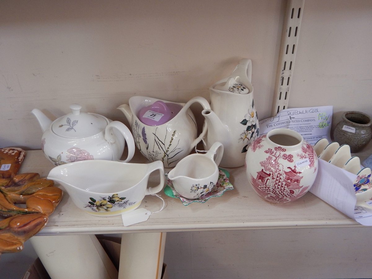 A Midwinter Stylecraft 'Whispering Grass' teapot, a Honiton pottery four-division toast rack,