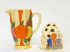 A Clarice Cliff Bizarre 'Crocus' pattern rock flower holder, 11cm high and a Bizarre jug,