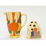 A Clarice Cliff Bizarre 'Crocus' pattern rock flower holder, 11cm high and a Bizarre jug,