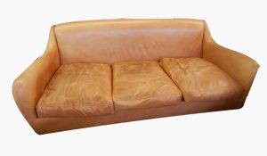 A Balzac sofa in tan leather,