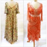 A 1970's Sujon floral maxi dress with deep V neck and frilled cap sleeves,