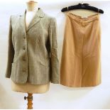 A large quantity of vintage tweed skirts, including Jaeger, etc.