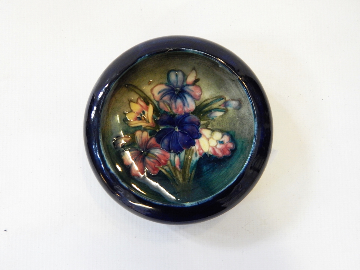 A Moorcroft small pottery bowl with inverted border,