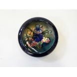 A Moorcroft small pottery bowl with inverted border,